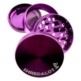 Sir Shredalot 63mm 4-part Grinder in purple, disassembled view, showcasing sharp teeth and fine screen