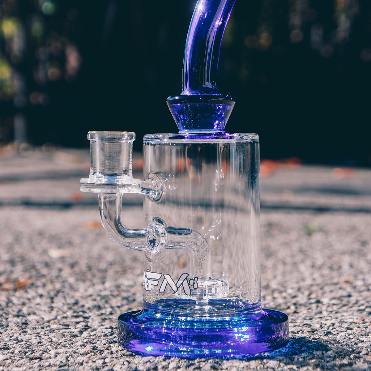 AFM 8" Milky Matrix Perc Glass Dab Rig with Bent Neck and Colored Accents - Outdoor View