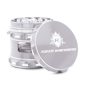Kozo 2.5 inch window grinder in silver, side viewing window with the lid tilted open to show the teeth