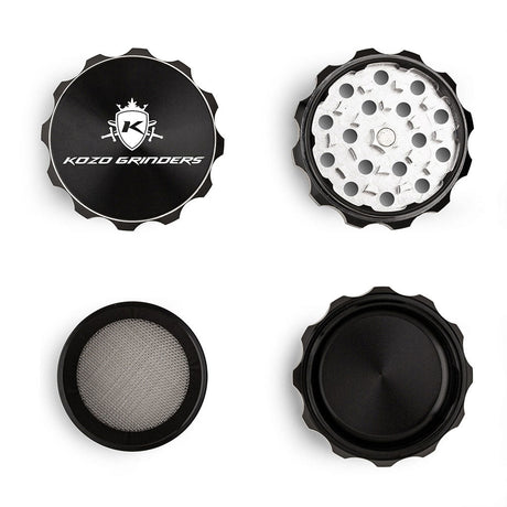 Kozo 2 inch four-piece aluminum grinder in black, four pieces laid flat showing lid, teeth, screen and base