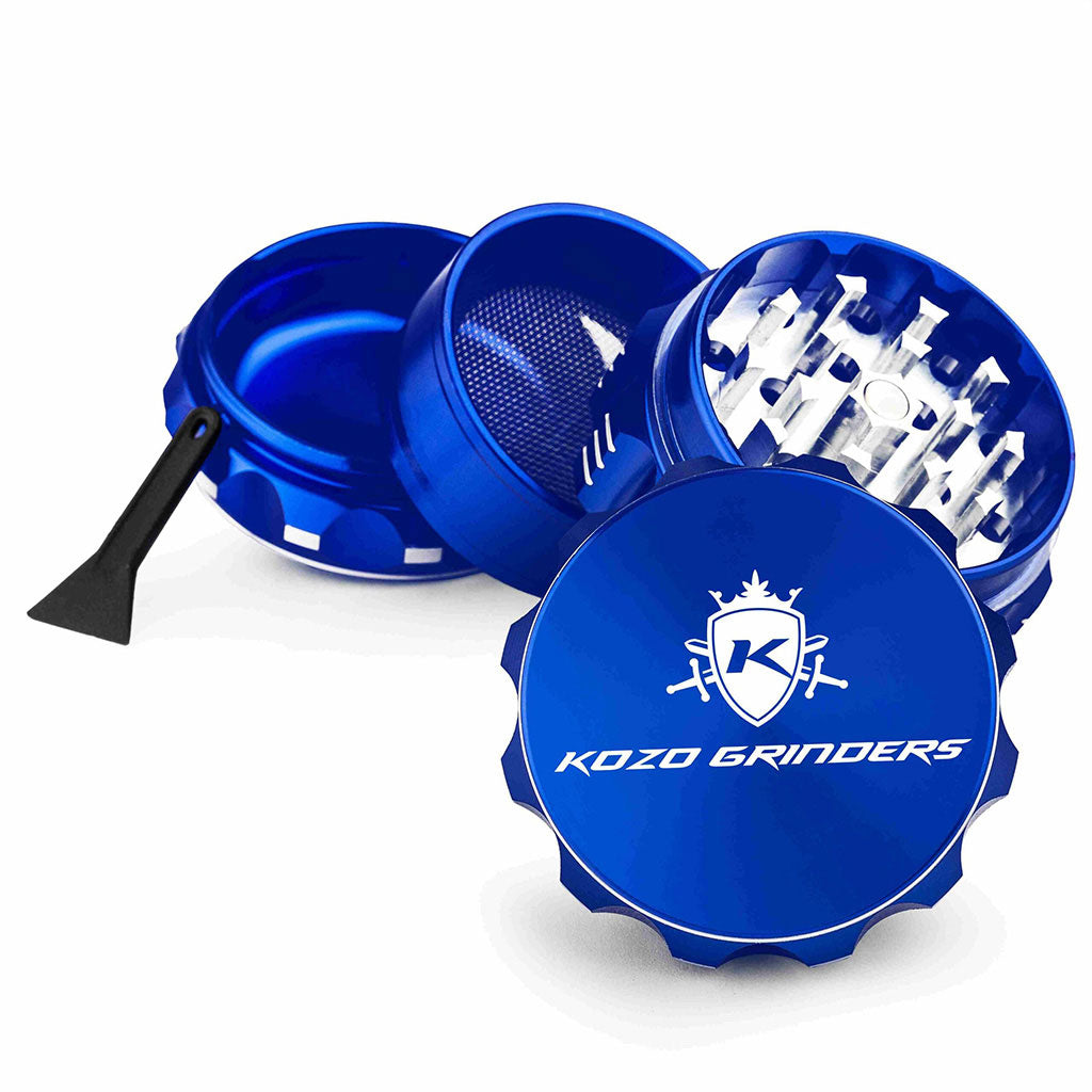 Kozo 2 inch four-piece aluminum grinder in blue, split into four pieces with the pollen scraper
