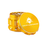 Kozo 2 inch four-piece aluminum grinder in gold, lid tilted open beside the toothed grinding chamber