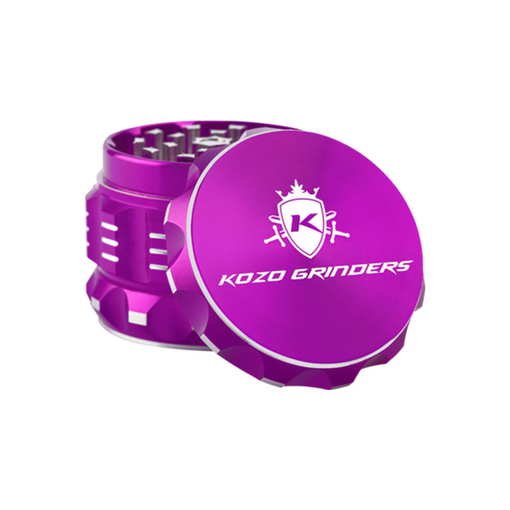 Kozo 2 inch four-piece aluminum grinder in purple, lid tilted open beside the toothed grinding chamber