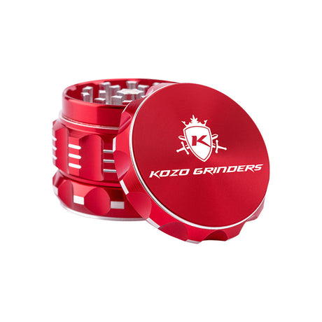 Kozo 2 inch four-piece aluminum grinder in red, lid tilted open beside the toothed grinding chamber