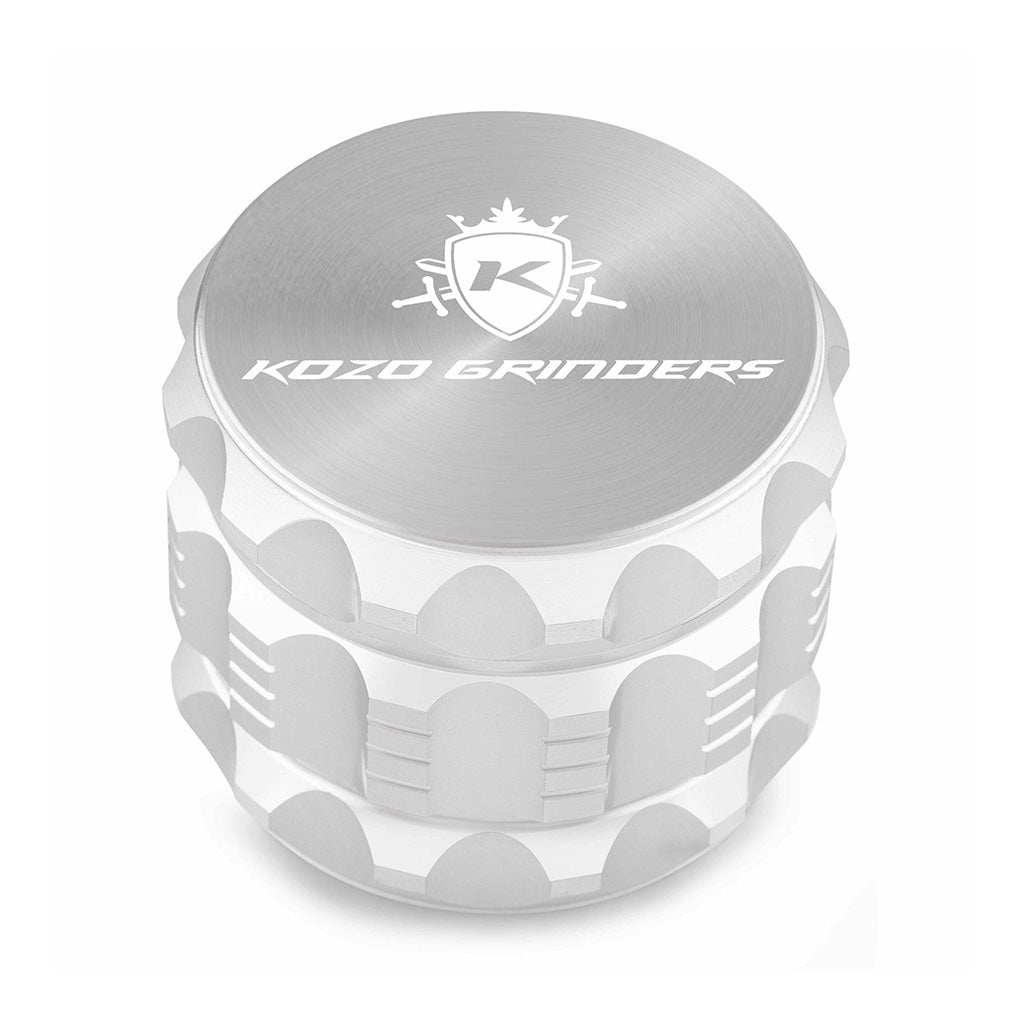 Kozo 2 inch four-piece aluminum grinder in silver, closed front view of the body with the Kozo logo lid