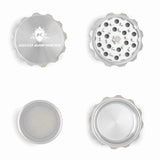 Kozo 2 inch four-piece aluminum grinder in silver, four pieces laid flat showing lid, teeth, screen and base