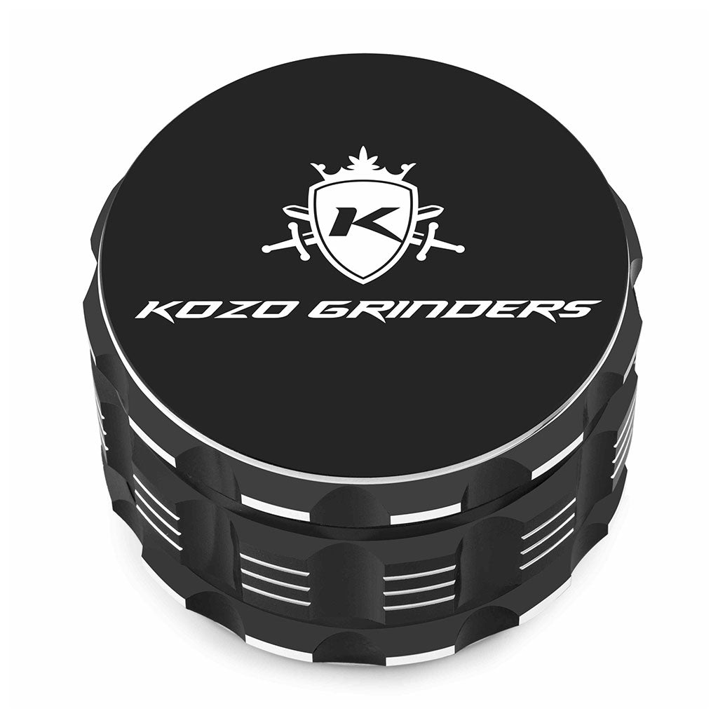 Kozo 3 inch four-piece anodized aluminum grinder in black, closed front view of the body with the Kozo logo lid