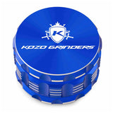 Kozo 3 inch four-piece anodized aluminum grinder in blue, closed front view of the body with the Kozo logo lid