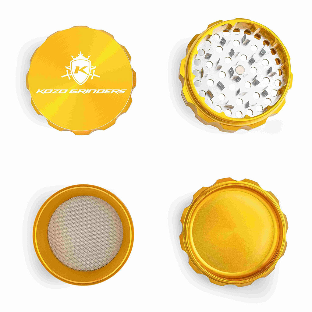 Kozo 3 inch four-piece anodized aluminum grinder in gold, four pieces laid flat showing lid, teeth, screen and base