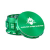 Kozo 3 inch four-piece anodized aluminum grinder in green, lid tilted open beside the toothed grinding chamber