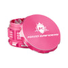 Kozo 3 inch four-piece anodized aluminum grinder in pink, lid tilted open beside the toothed grinding chamber