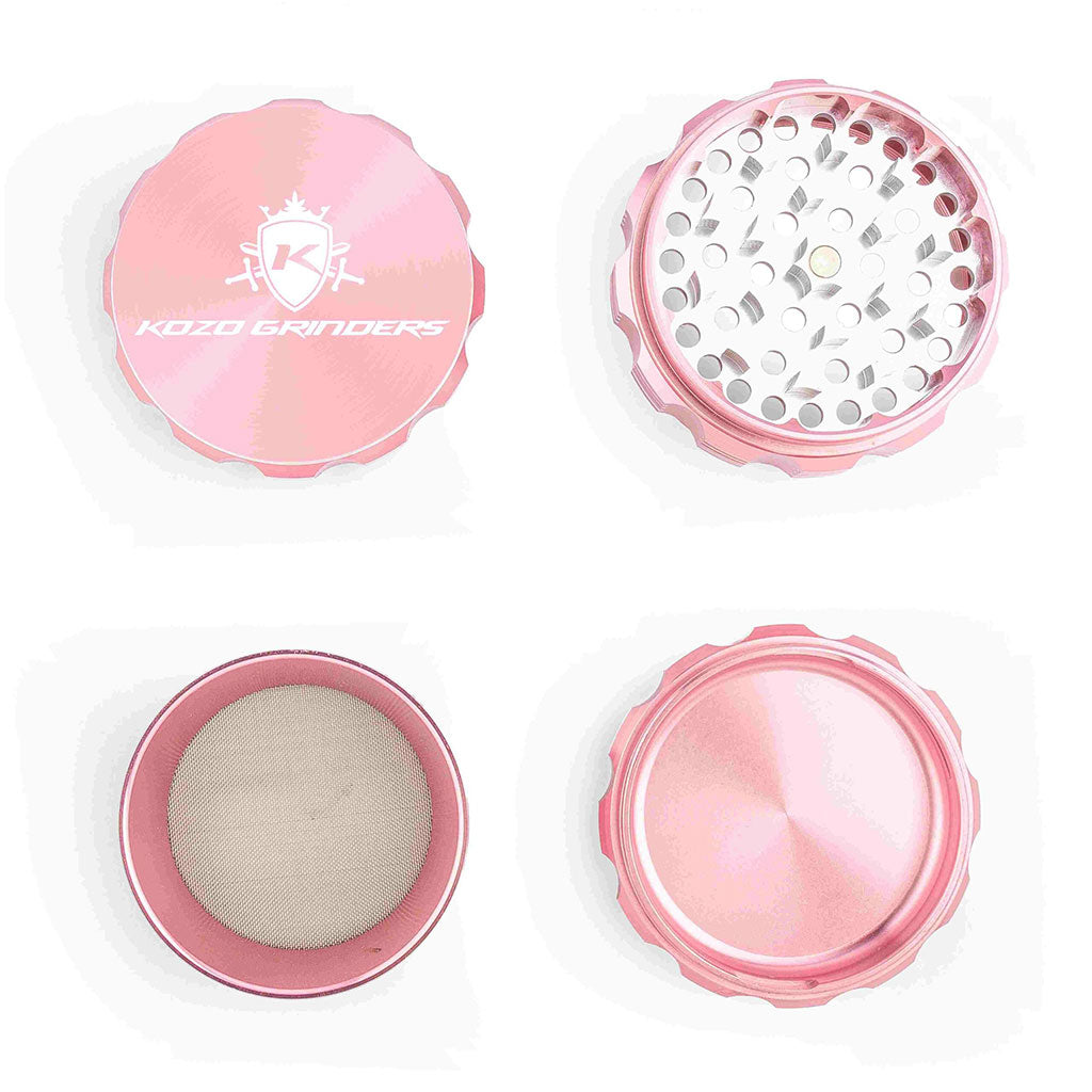 Kozo 3 inch four-piece anodized aluminum grinder in rose gold, four pieces laid flat showing lid, teeth, screen and base