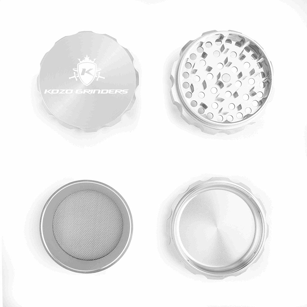 Kozo 3 inch four-piece anodized aluminum grinder in silver, four pieces laid flat showing lid, teeth, screen and base