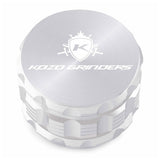Kozo 3 inch four-piece anodized aluminum grinder in silver, closed front view of the body with the Kozo logo lid