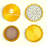 Kozo 4 inch four-piece anodized aluminum grinder in gold, four pieces laid flat showing lid, teeth, screen and base