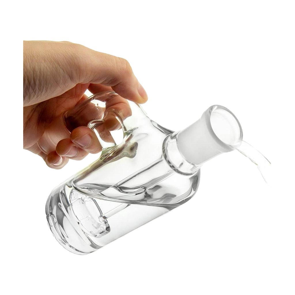 Hand holding PILOT DIARY 18mm Ash Catcher at 90 Degree angle, clear glass, isolated on white