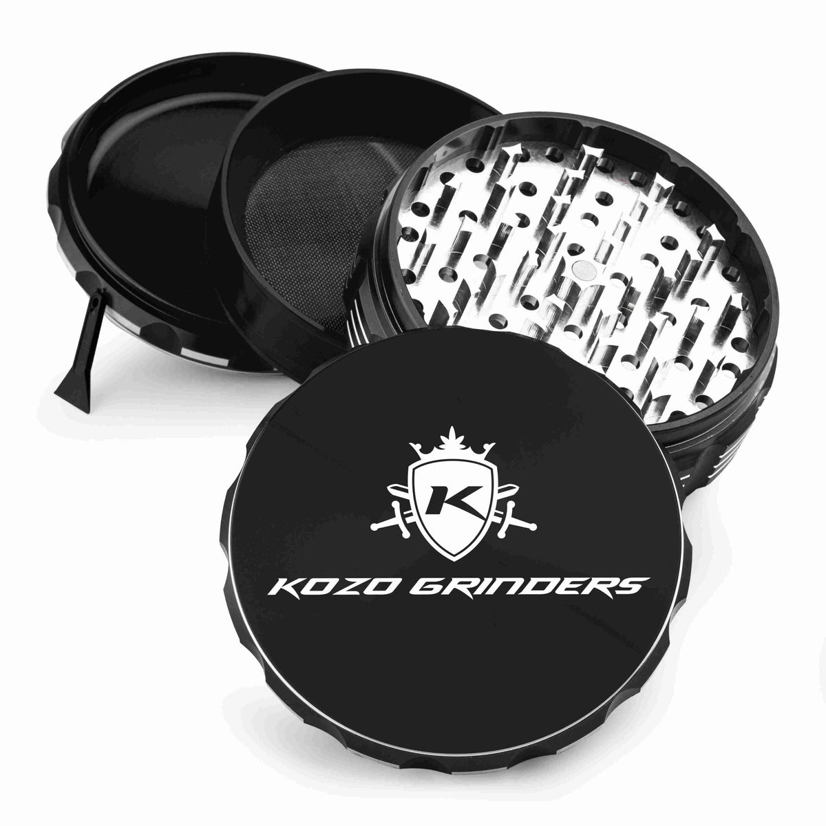 Kozo 4 inch four-piece anodized aluminum grinder in black, split into four pieces with the pollen scraper