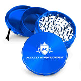 Kozo 4 inch four-piece anodized aluminum grinder in blue, split into four pieces with the pollen scraper