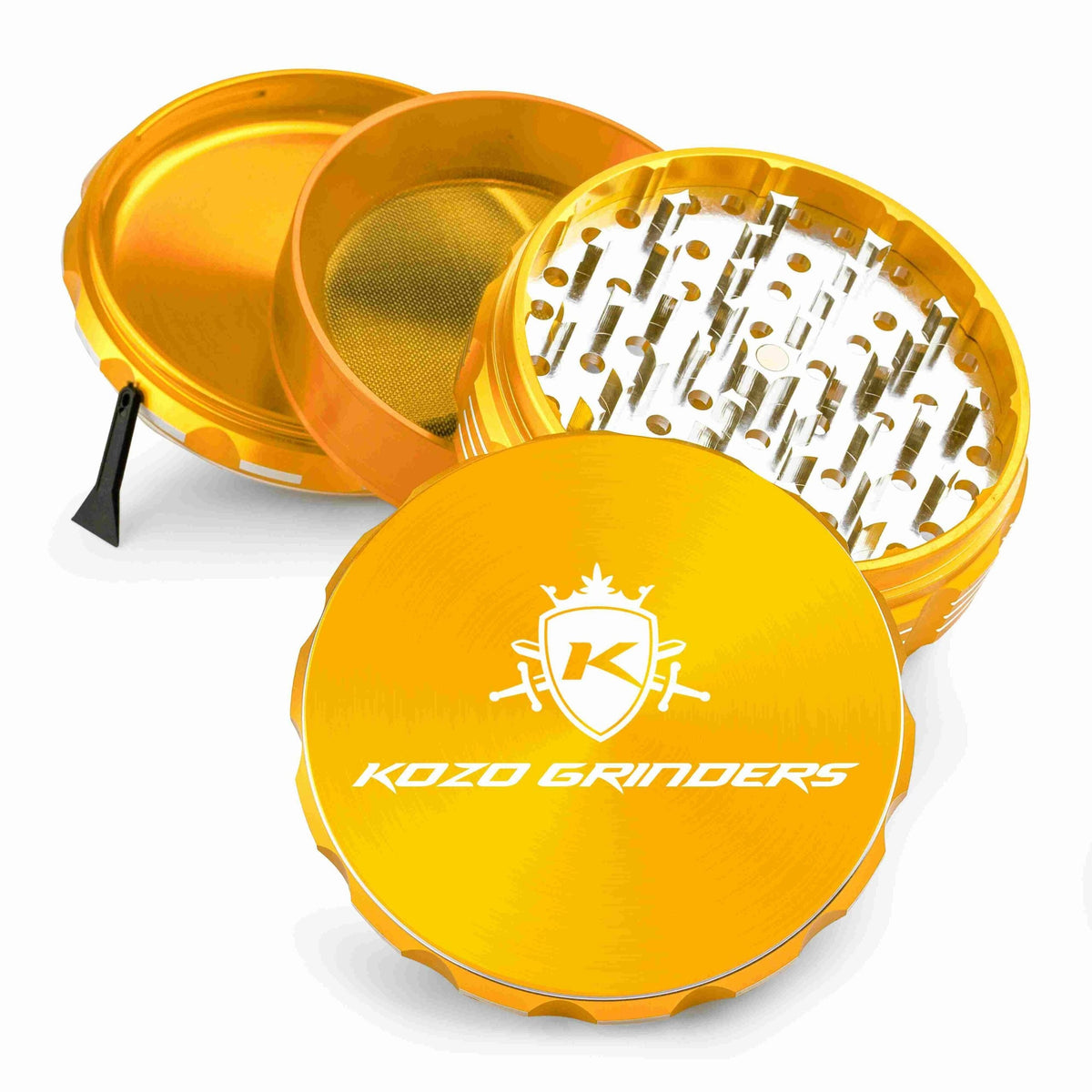 Kozo 4 inch four-piece anodized aluminum grinder in gold, split into four pieces with the pollen scraper