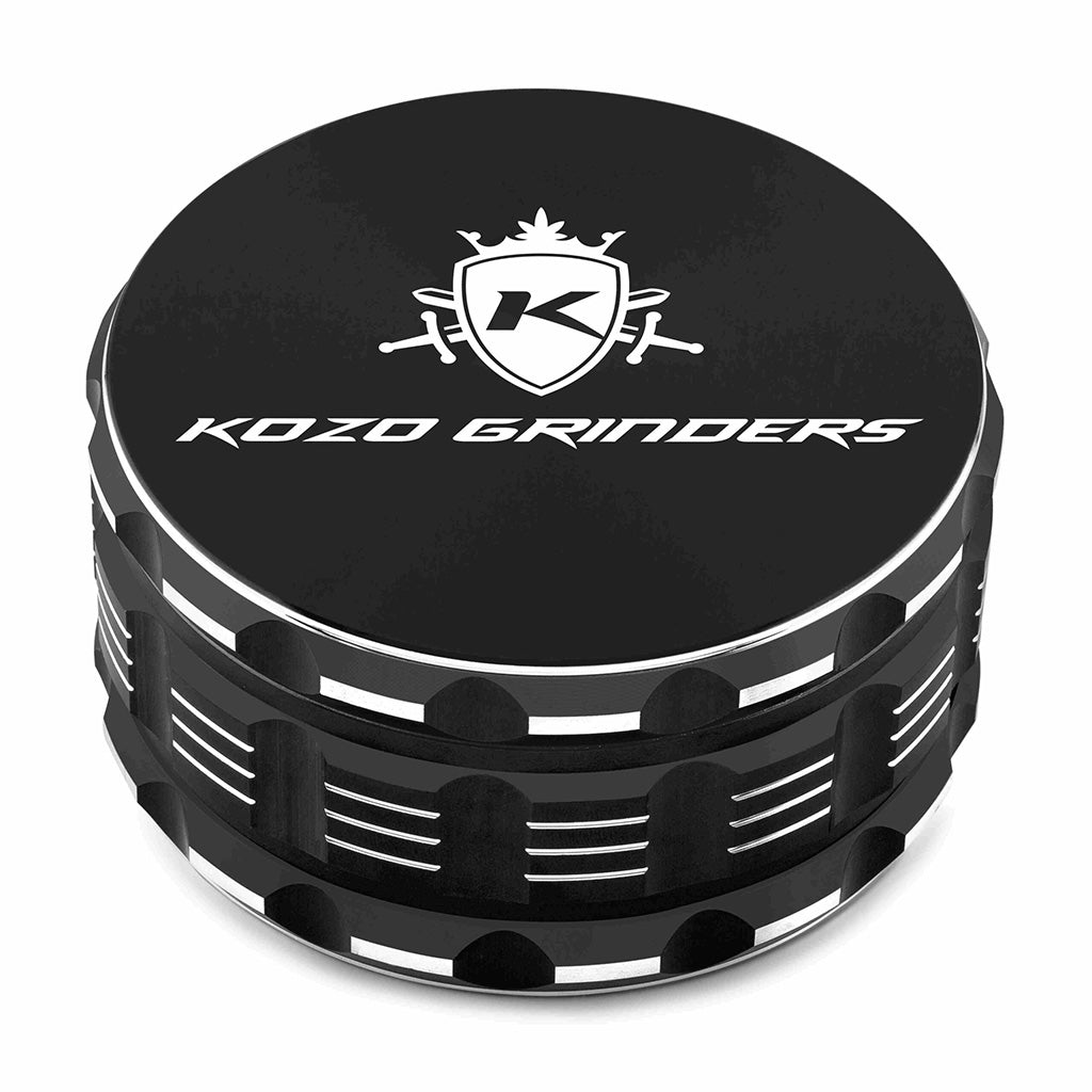Kozo 4 inch four-piece anodized aluminum grinder in black, closed front view of the body with the Kozo logo lid