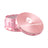 Kozo 4 inch four-piece anodized aluminum grinder in rose gold, lid tilted open beside the toothed grinding chamber