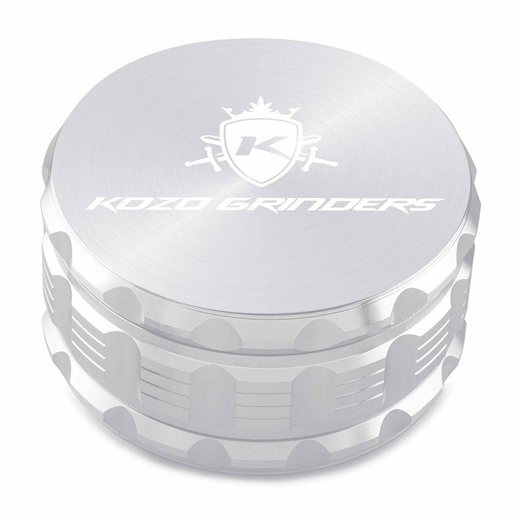 Kozo 4 inch four-piece anodized aluminum grinder in silver, closed front view of the body with the Kozo logo lid