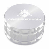 Kozo 4 inch four-piece anodized aluminum grinder in silver, closed front view of the body with the Kozo logo lid