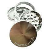 Sir Shredalot 4-part clear chamber grinder with sharp teeth and textured grip, top view