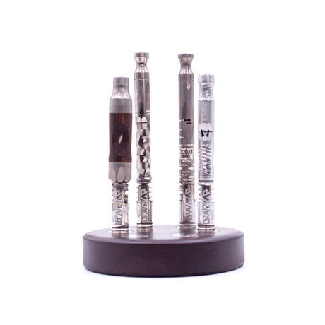 6-slot round wooden base with DynaVap vaporizers displayed upright, front view on white background