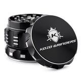 Kozo 2 inch aircraft-grade aluminum grinder in black, angled view with the lid tilted open and logo visible
