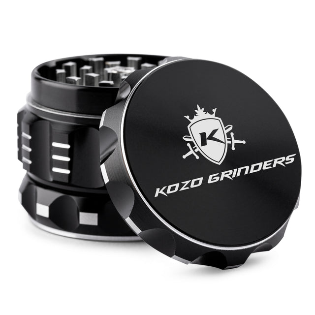 Kozo 2 inch aircraft-grade aluminum grinder in black, angled view with the lid tilted open and logo visible