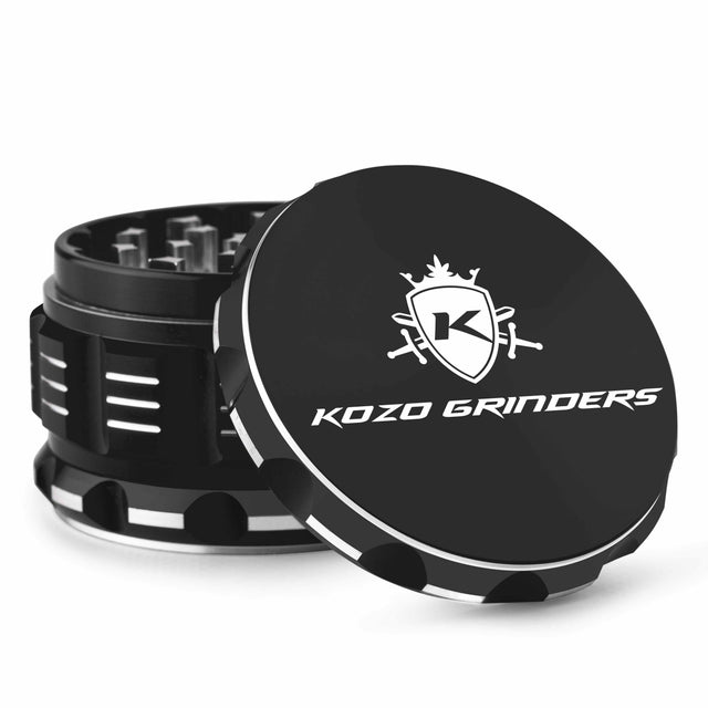 Kozo 3 inch aircraft-grade aluminum grinder in black, angled view with the lid tilted open and logo visible