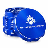Kozo 2 inch aircraft-grade aluminum grinder in blue, angled view with the lid tilted open and logo visible