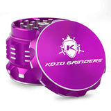 Kozo 2 inch aircraft-grade aluminum grinder in purple, angled view with the lid tilted open and logo visible