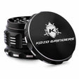 Kozo 2.5 inch aircraft-grade aluminum grinder in black, angled view with the lid tilted open and logo visible