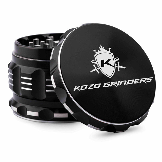Kozo 2.5 inch aircraft-grade aluminum grinder in black, angled view with the lid tilted open and logo visible
