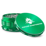 Kozo 4 inch aircraft-grade aluminum grinder in green, angled view with the lid tilted open and logo visible