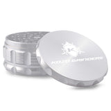 Kozo 4 inch aircraft-grade aluminum grinder in silver, angled view with the lid tilted open and logo visible