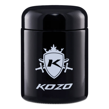 Kozo 1/2 oz black UV glass storage jar with the large Kozo logo facing front, airtight lid on