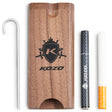 Kozo wood dugout with Kozo logo laid out with a hooked cleaning tool, dark metal rod and glass piece