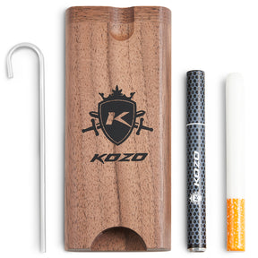 Kozo wood dugout with Kozo logo laid out with a hooked cleaning tool, dark metal rod and glass piece