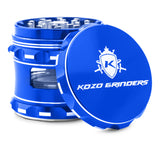 Kozo 2.5 inch window grinder in blue, angled view with the lid tilted open and side window visible