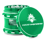Kozo 2.5 inch window grinder in green, angled view with the lid tilted open and side window visible