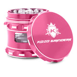 Kozo 2.5 inch window grinder in pink, angled view with the lid tilted open and side window visible