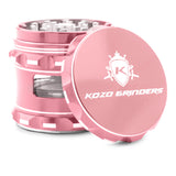 Kozo 2.5 inch window grinder in rose gold, angled view with the lid tilted open and side window visible