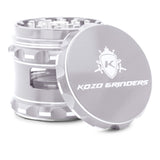 Kozo 2.5 inch window grinder in silver, angled view with the lid tilted open and side window visible