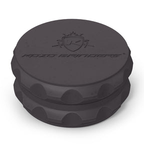 Kozo 2.5 inch two-piece hemp grinder in black, closed view of the matte textured body with the Kozo logo on the lid