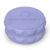 Kozo 2.5 inch two-piece hemp grinder in blue, closed view of the matte textured body with the Kozo logo on the lid