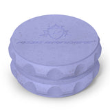 Kozo 2.5 inch two-piece hemp grinder in blue, closed view of the matte textured body with the Kozo logo on the lid