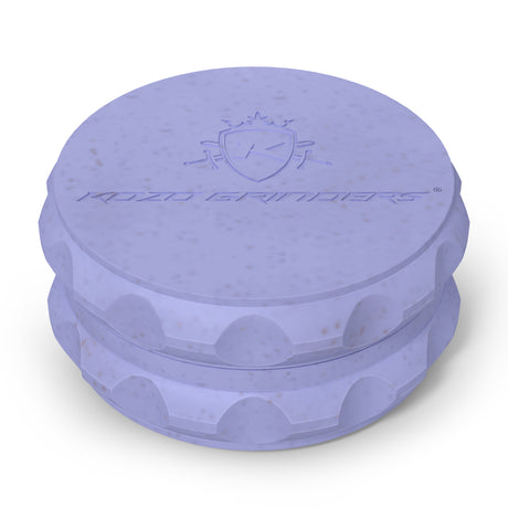 Kozo 2.5 inch two-piece hemp grinder in blue, closed view of the matte textured body with the Kozo logo on the lid